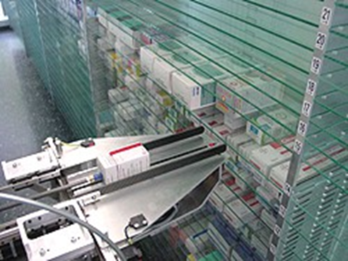 TECH-ROB automated dispensing robot — real pharmacy deployment with cartesian gripper and medication shelves